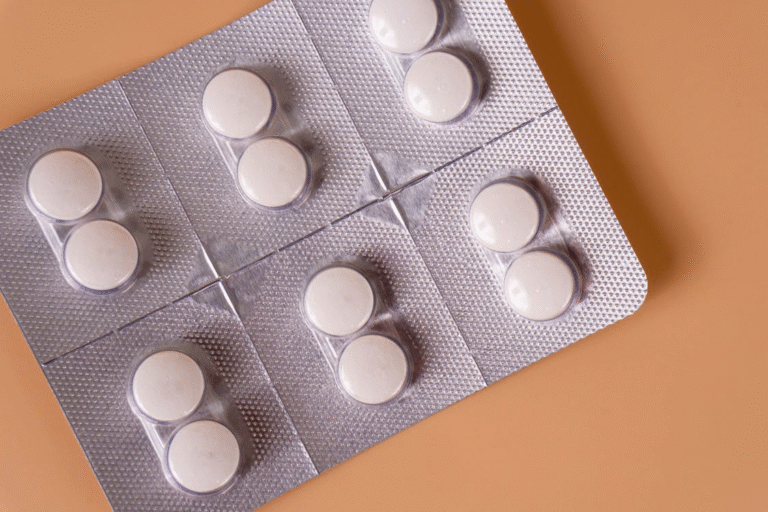 An image of a pack of white pills