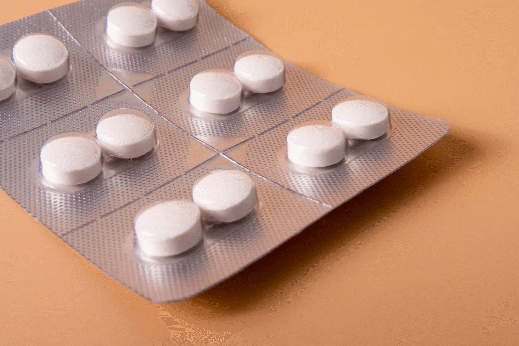 An image of a pack of white pills