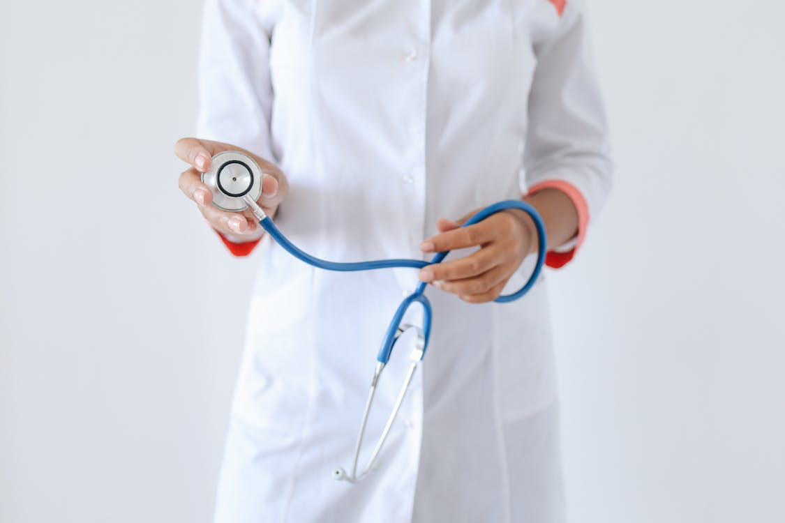 An image of a person holding a stethoscope