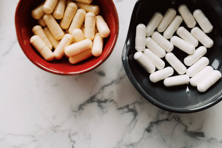 An image of pills in two different bowls