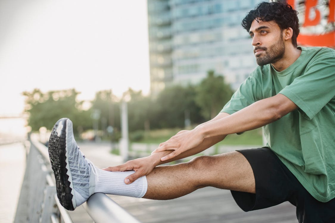 A man stretching before running