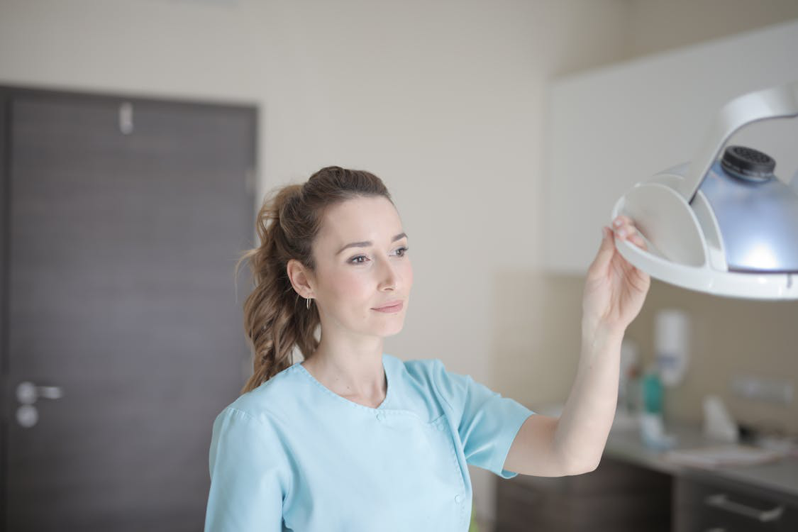 An image of a woman holding equipment    