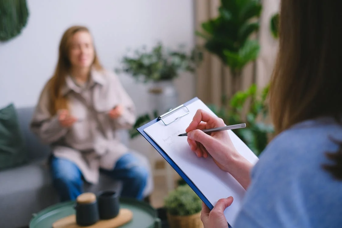 A person talking to a specialist