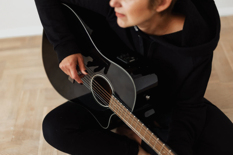 A person playing a guitar