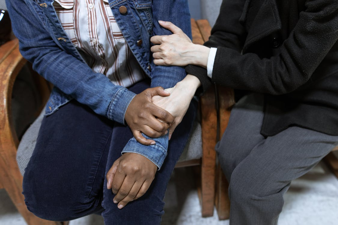 people holding each other