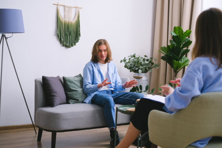 An image of a man talking to a therapist