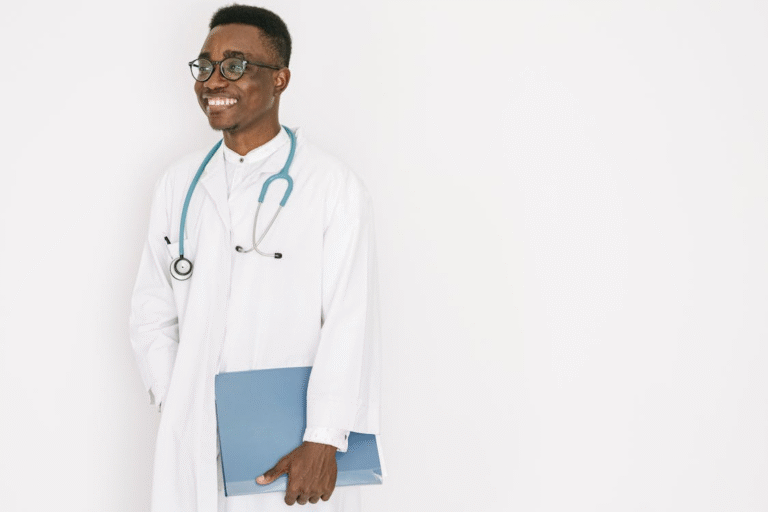 An image of a doctor with a file in his hand and a stethoscope around his neck