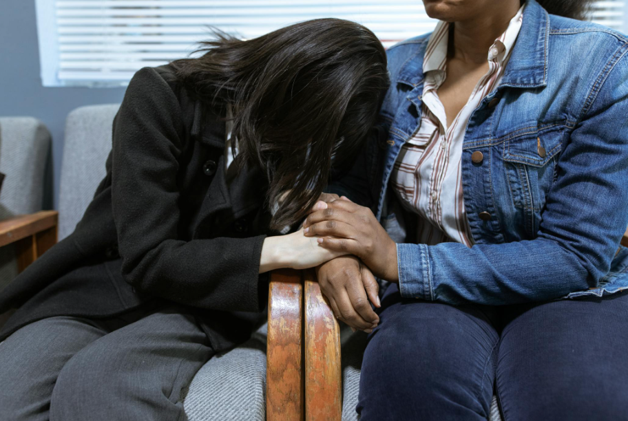This image shows a couple during registration in a clinic.