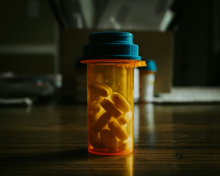 an orange bottle of medication