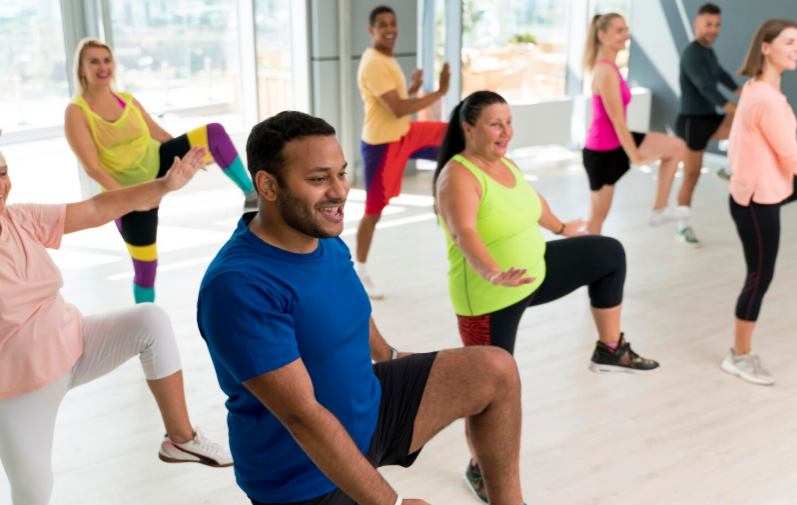  People having fun and exercising together in a Zumba fitness class