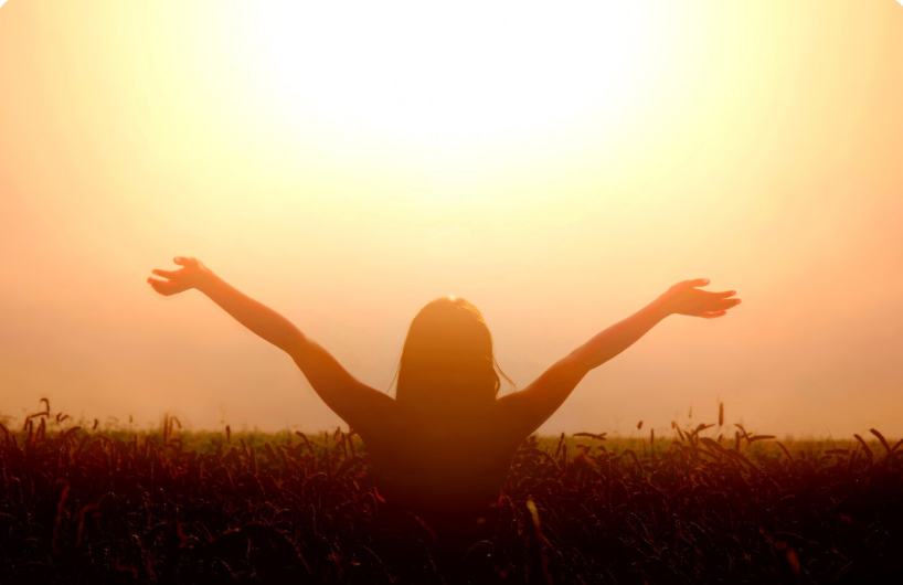 Person releasing stress symbolically to represent emotional letting go and healing