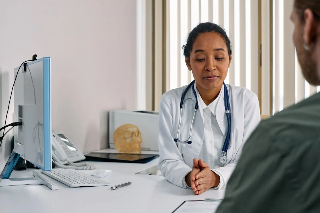 Doctor consulting with a patient during a medically supervised addiction treatment session