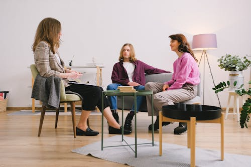 A professional counselor talking to a couple