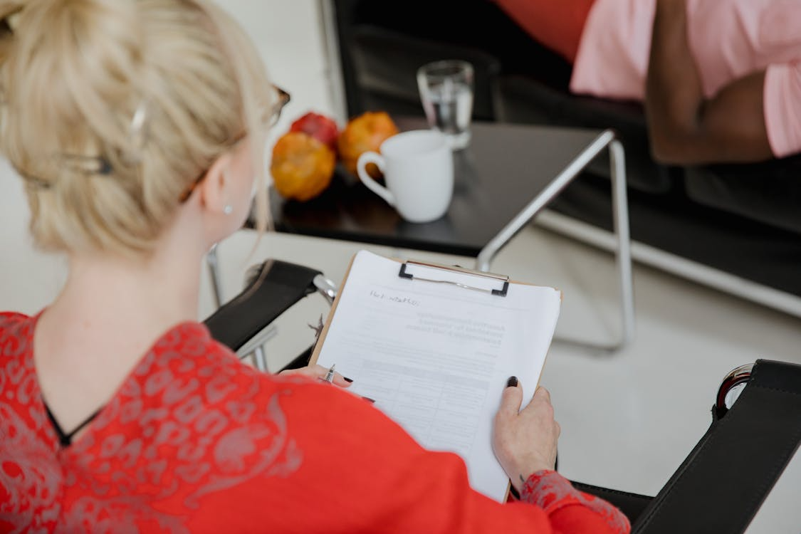 A specialist guiding clients through a tailored treatment plan