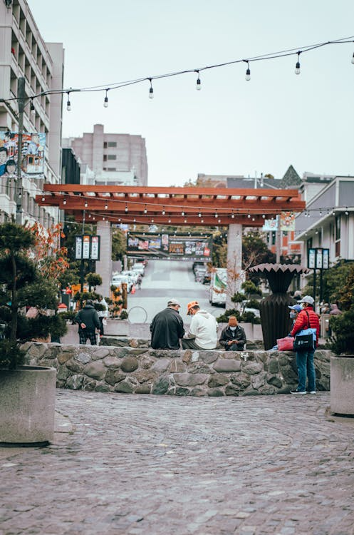 People socializing outdoors in a community setting