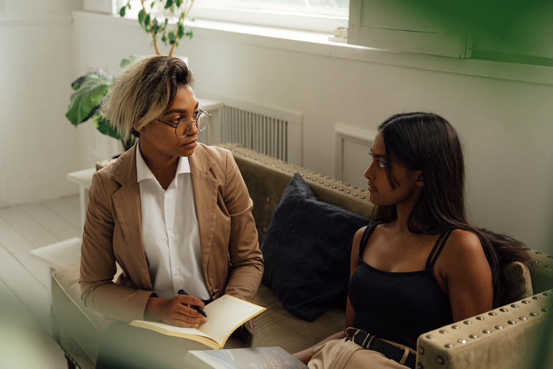 A counselor talking to her client