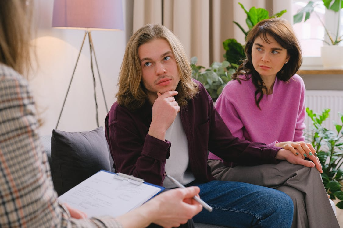 A couple is having a therapy session for emotional recovery purposes