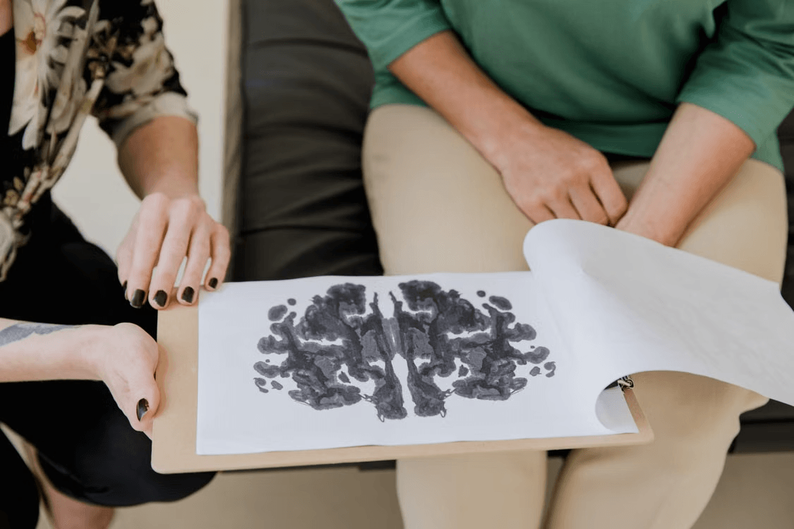 a person going through art to understand behavioral health